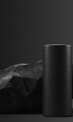 bottle-of-essential-massage-oil-on-stone-beauty-treatment-minimal-black-design-packaging-mock-up.jpg